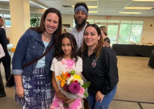 young girl building relationship with community